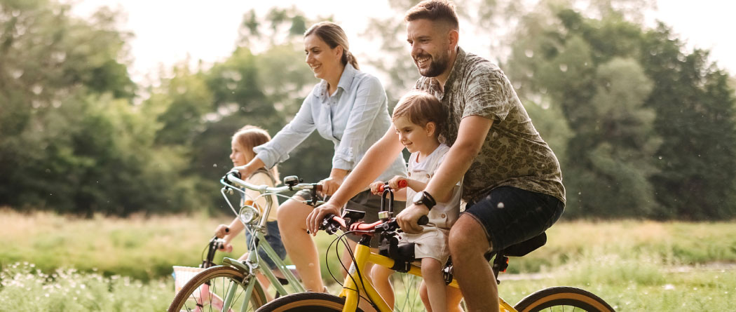 A young family riding bikes