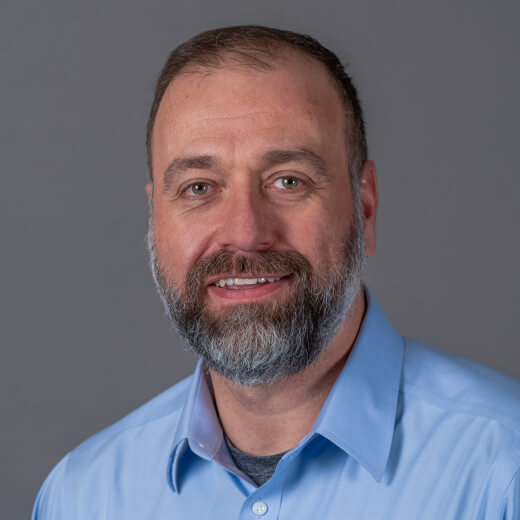 Headshot of team member Neb