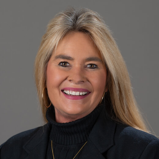 Headshot of team member Anne