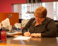 teller working at bank desk