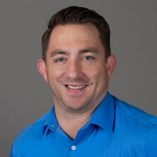 Headshot of team member Nick